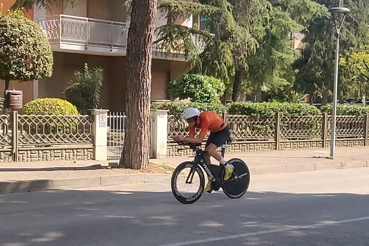 triathlete riding its bike during IM Italy