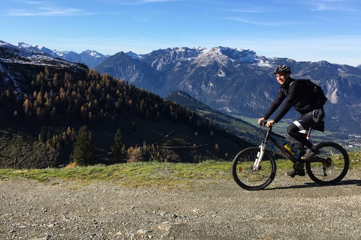 Clément riding his mountain bike on a trail
